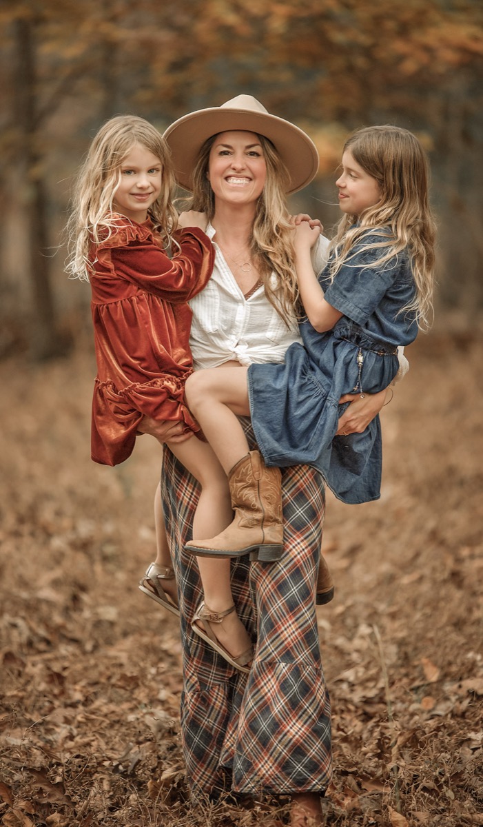 Brisa carrying her two girls