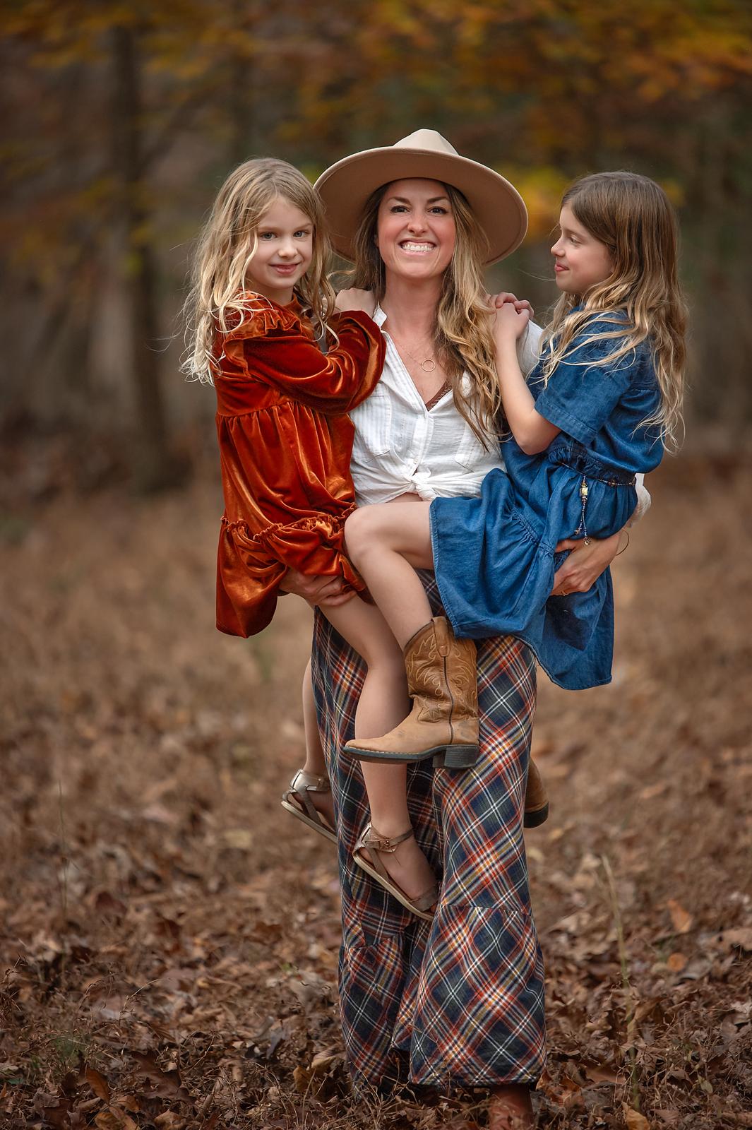 Brisa holding her two girls